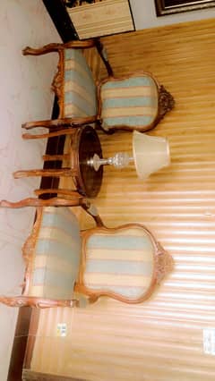 2 chairs with a centre table