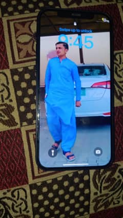 iphone mobile12 64 jv 3 months sim working bilkul ok ha health orignal