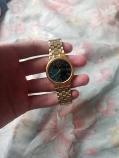 golden colour watch