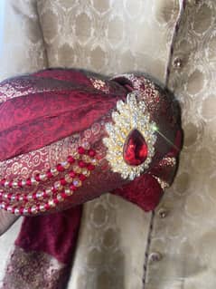Groom sherwani with matching qulla