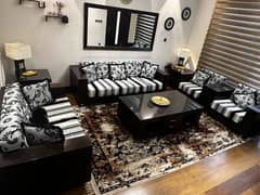 Wooden sofa and table set for sitting area