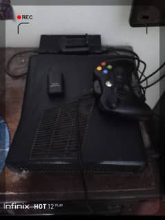 Xbox 360 with two wire less controllers.