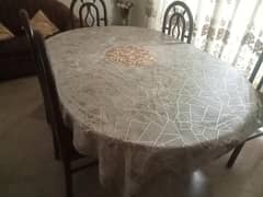 wooden dining table with 6 chairs