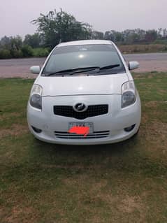 toyota vitz white colour original car very good condition smooth drive