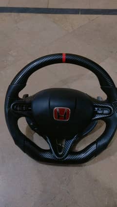 Carbon fiber steering with multimedia and Cruse control