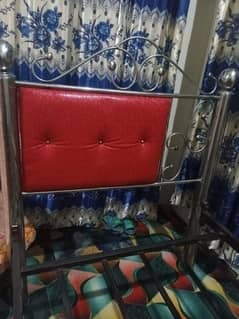 single bed two pieces steel without matress and without hardboard. . . . .