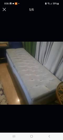 Ottoman with heavy wooden structure made