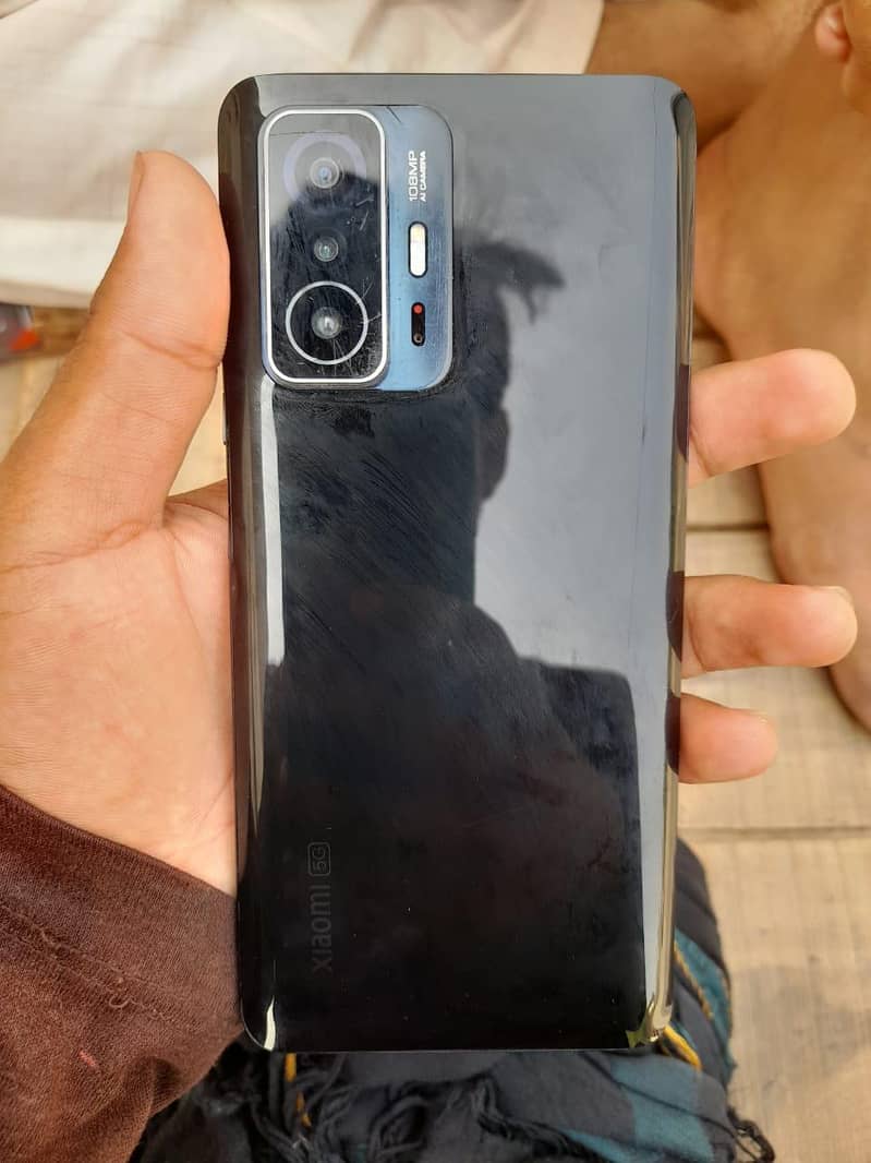 MI 11,t black colour memory 8 256 condition face lock okay 0