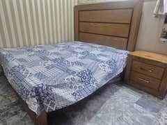 double bed with 2 side tables
