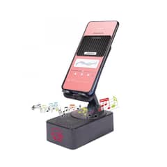 phone stand with Bluetooth speaker + power bank