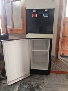 PEL water dispenser with refrigerator almost new