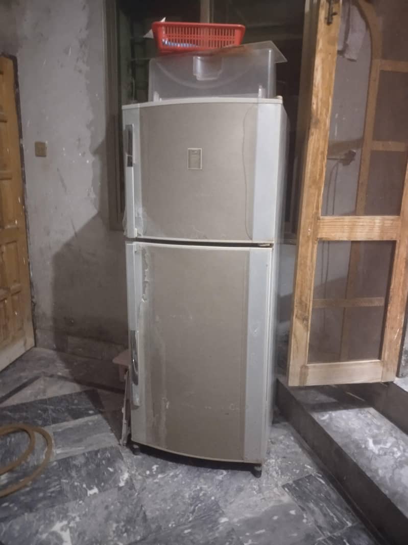 large size refrigerator with first class cooling 10/10  condition 1