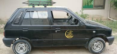 Suzuki Mehran Taxi. Black Yellow.