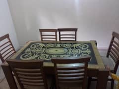 Wooden dining table with chairs for sale