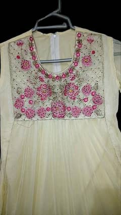 cream colour frock and sharah