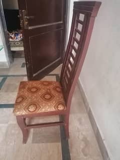 wood and glass dining table with chairs
