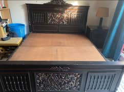 One wooden double bed without side tables wothout mattress