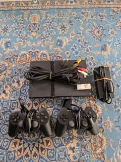 Ps2 JailBreaked with 2wires set with 2 supplies 2 controllers 64Gb USB