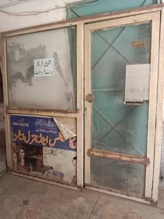 Glass door for saloon and other uses