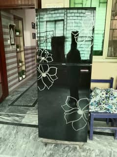 Only 2 years used glass door fridge for urgent sale