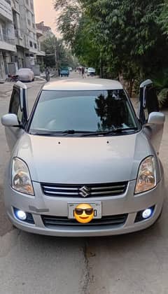 Suzuki Swift Dlx 2011 Total genuine.