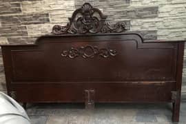 Strong wooden bed with mattress