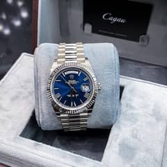 WATCH BUYER | Rolex President Chopard Happy Diamonds Breitling Avenger
