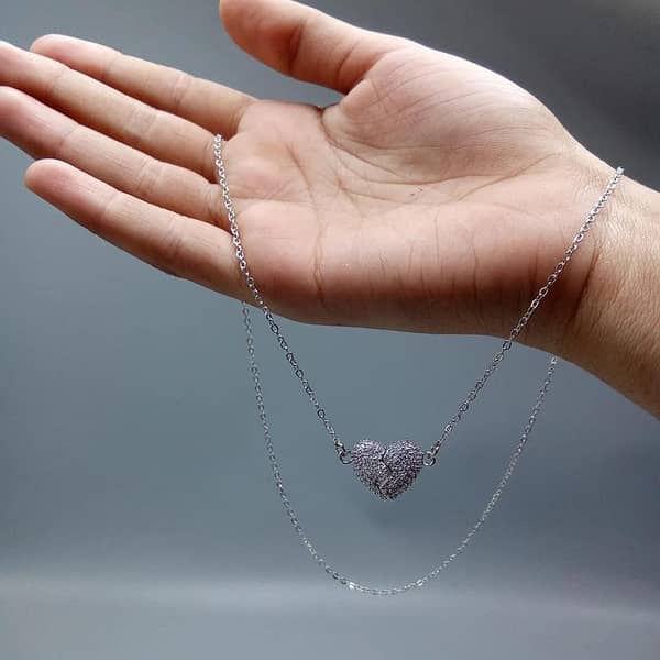 Hollow Silver Heart Pendant Necklace with Long Chain for Women