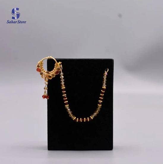 Stylish golden nose nath only used non pericing woman