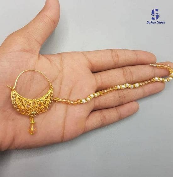 new style golden nath with pearls only used for peircing girls and woman