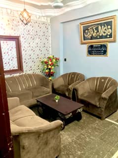 7 seater sofa + Center table + Flowers