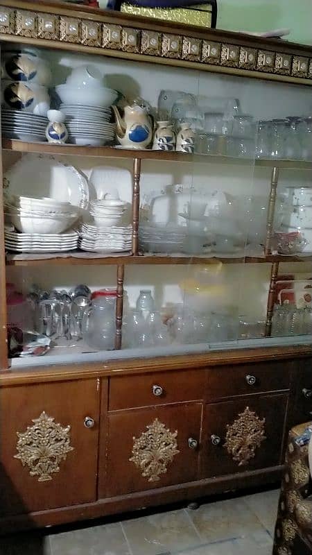 double bed with side tables, dressing and show case 4