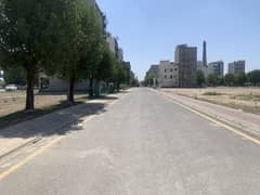 20 marla plot for sale in lda avenue1 block D  Investors rate  Hot location  Main apporced  Owner needed