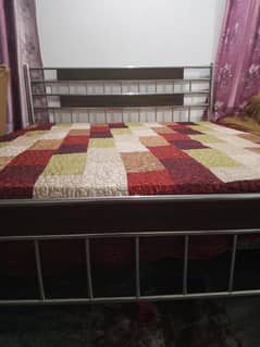 steel bed with mattress