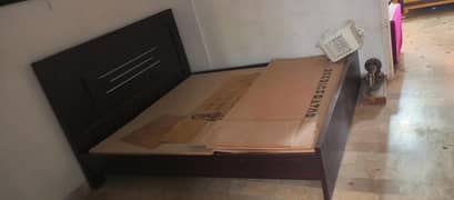 king size bed and cub board