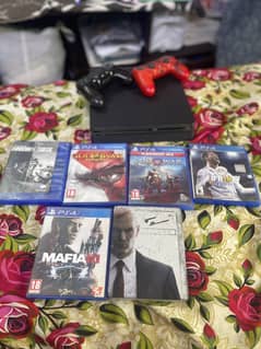 PS4  1TB with two controllers and 6 CD’s