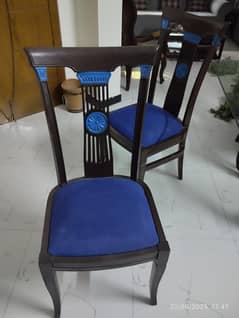 6 seater dinning table with blue cushioned chair