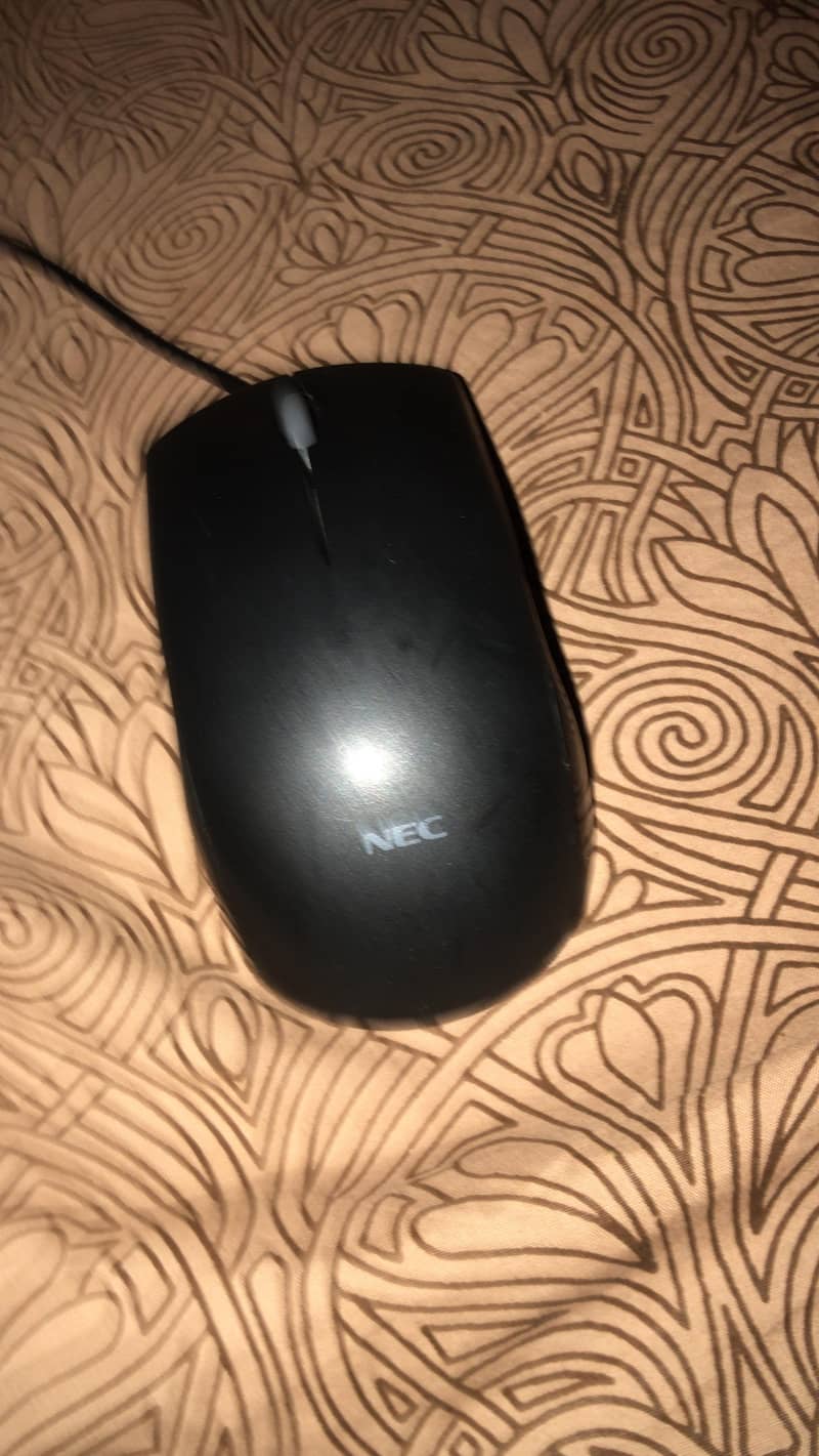 Toshibha tecra upgraded with a pointig wired mouse and charger 3