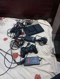 Ps2 JailBreaked with 2wires set with 2 supplies 2 controllers 64Gb USB