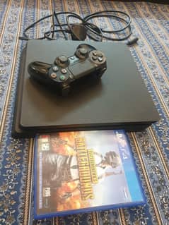 PS4 Slim 1TB with 2 original controllers and 3 games.