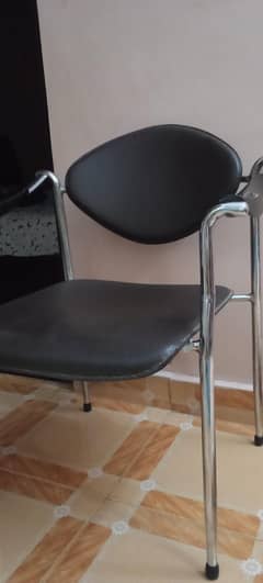 Good quality pair of chairs with metal frame work