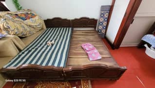 two single beds with mettress