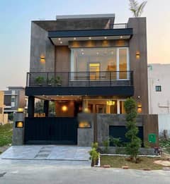 Charming 5-Marla House for Sale Near Park in DHA Phase 9-Town Exclusive Living with 3 Beds, Modern Kitchen & Spacious Living Area Easy Deal with Wall Green Realtors