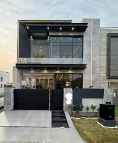 A Class Above 5-Marla Beautifully Crafted House for Sale in DHA Phase 9-Towns Hot Location with Wall Green Realtors Easy Deal
