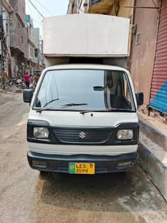 Suzuki Ravi with container
