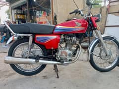Honda 125 2011 model red colour. excellent condition.