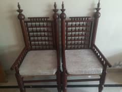 pure wooden chairs 70000 both