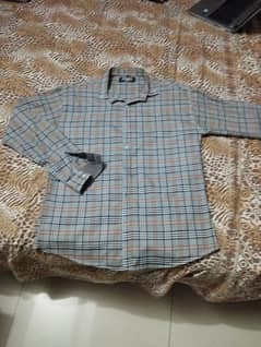 beautiful check Shirt  . age 18 to 20 year's. only 599
