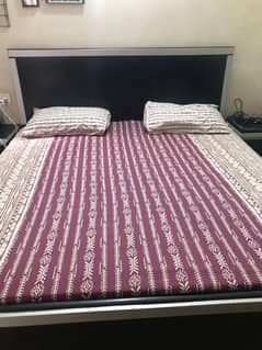 bed with 2 side tables and 3 almeera