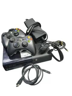 XBOX 360 with 2 CONTROLLERS 2 BATTERIES 1CAMERA 50+games in hard drive